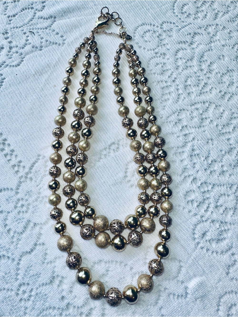 Amrita Singh gold multi strand bead statement